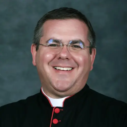 Episcopal priest, former foster care CEO, pleads guilty to federal wire fraud charge